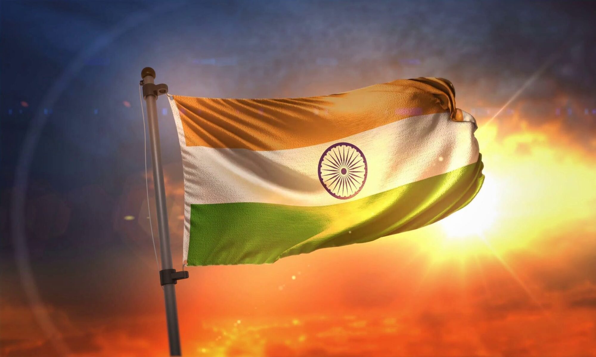 Indian national flag illuminated by a golden Independence Day sky