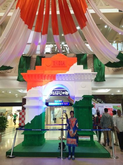 Large tricolour India Gate installation inside a shopping mall